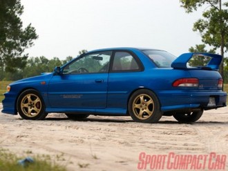 0701_sccp_07zsubaru_impreza_rs_gc8left_rear.jpg