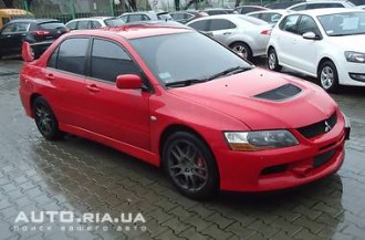 mitsubishi_lancer_evolution__70585931bx.jpg